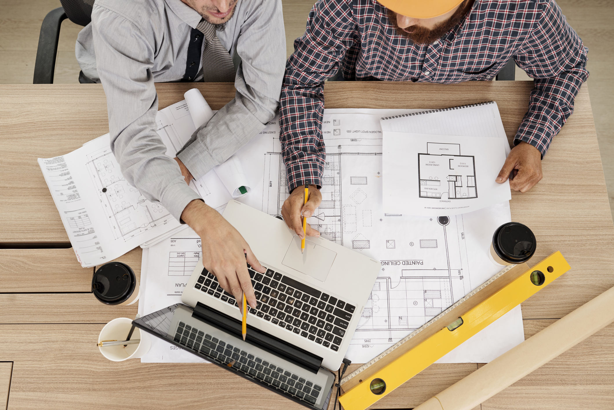 Construction workers consulting
